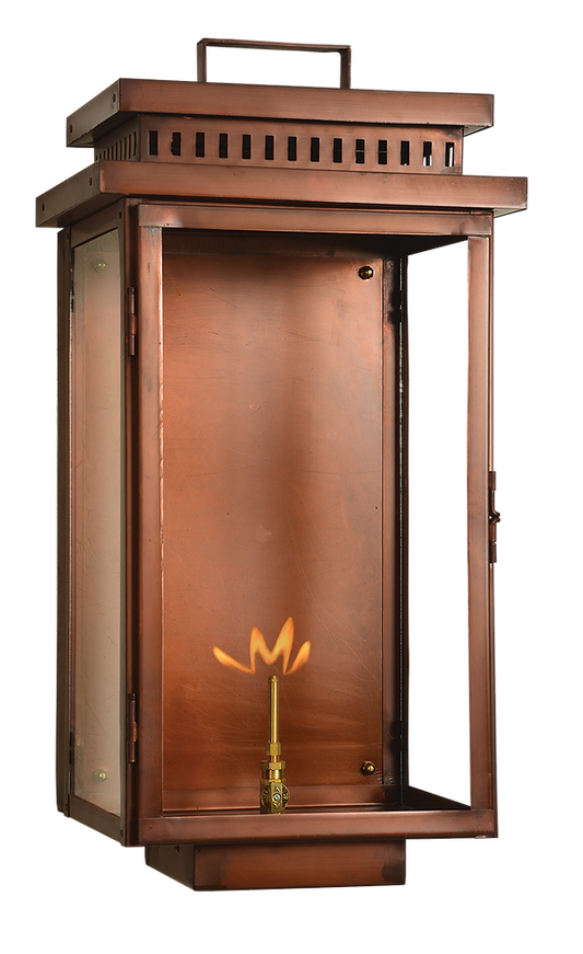 A copper Harper wall lantern with a gas powered lighting feature