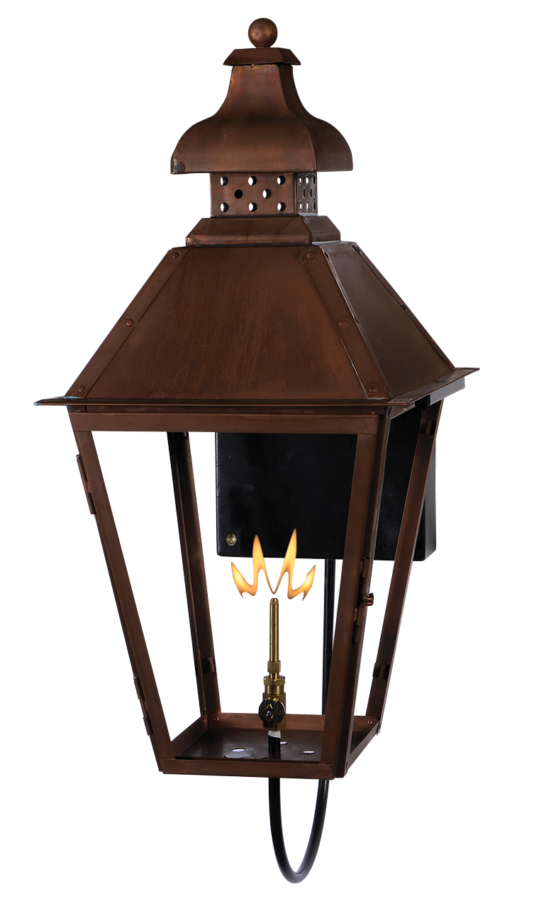 A copper Logan wall mount lantern with a gas powered lighting feature