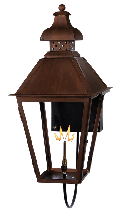 A copper Logan wall mount lantern with a gas powered lighting feature