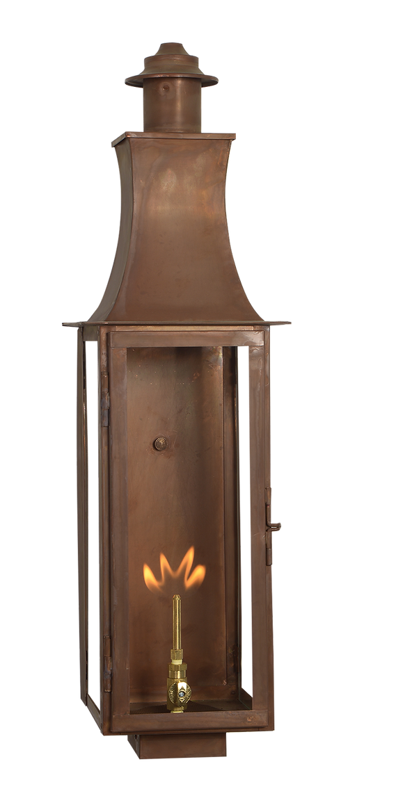 A copper Madison wall mount lantern is featured with a gas powered lighting option