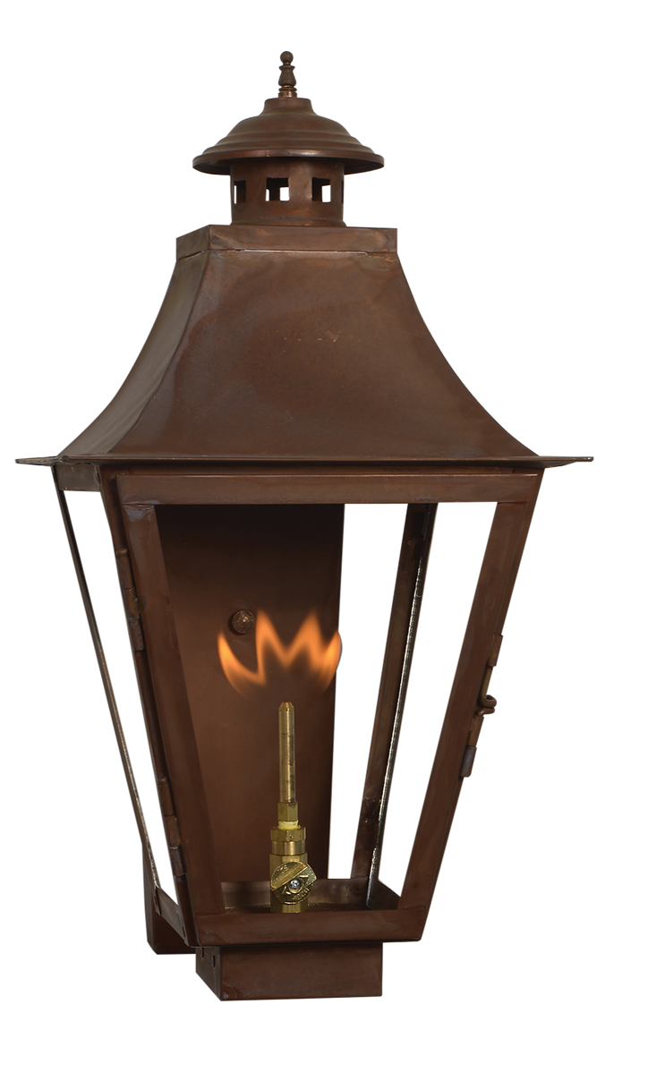A Montrose wall lantern with a gas powered lighting feature
