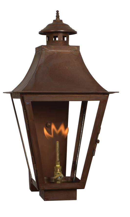 A Montrose wall lantern with a gas powered lighting feature