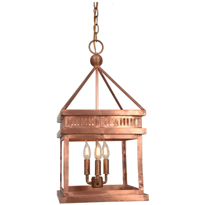 A copper Old Salt Run chandelier hung with a chain featuring a triple candelabra lighting option