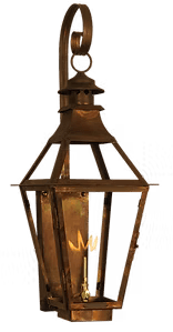 An example of a top curl finial on a wall mounted copper lantern