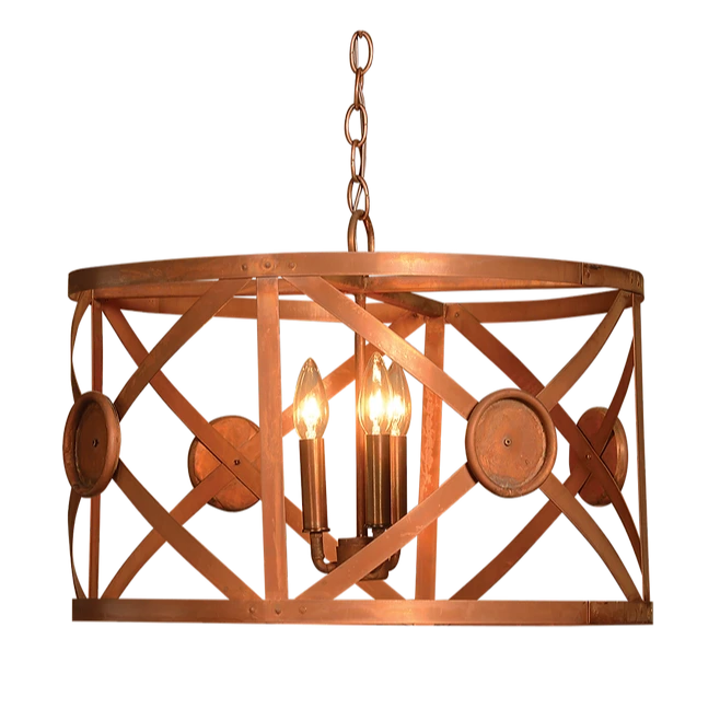 A copper XDrum chandelier is featured with criss crossing elements and a triple candelabra