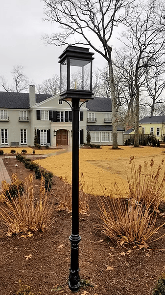 Somerset lantern featured outside as a yard post